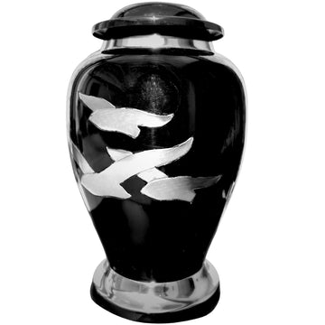 Black urn with silver butterfly designs on a white background