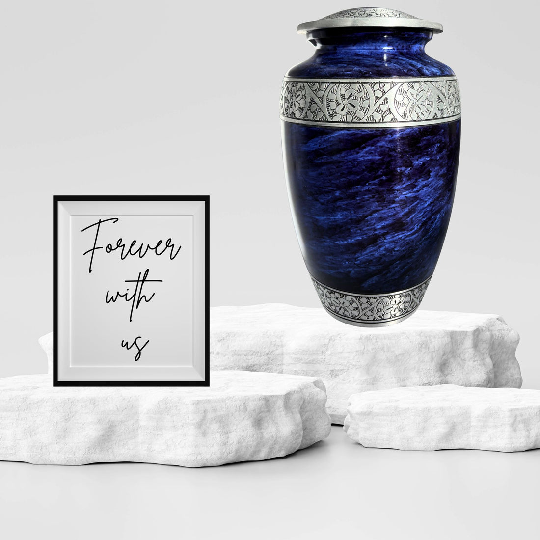Blue urn with silver decorative band on a white background