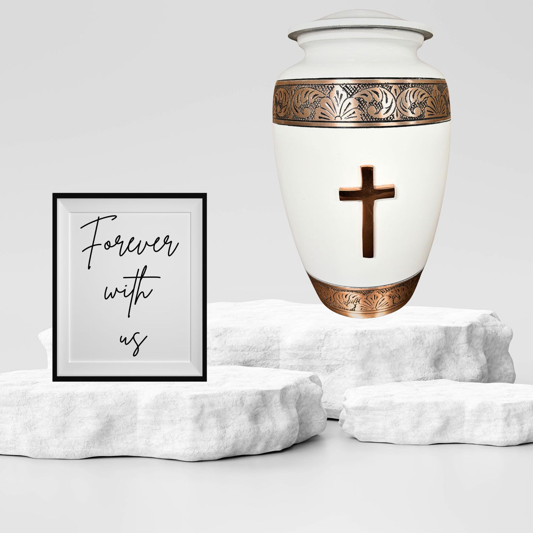 White urn with bronze cross and decorative band on a white background