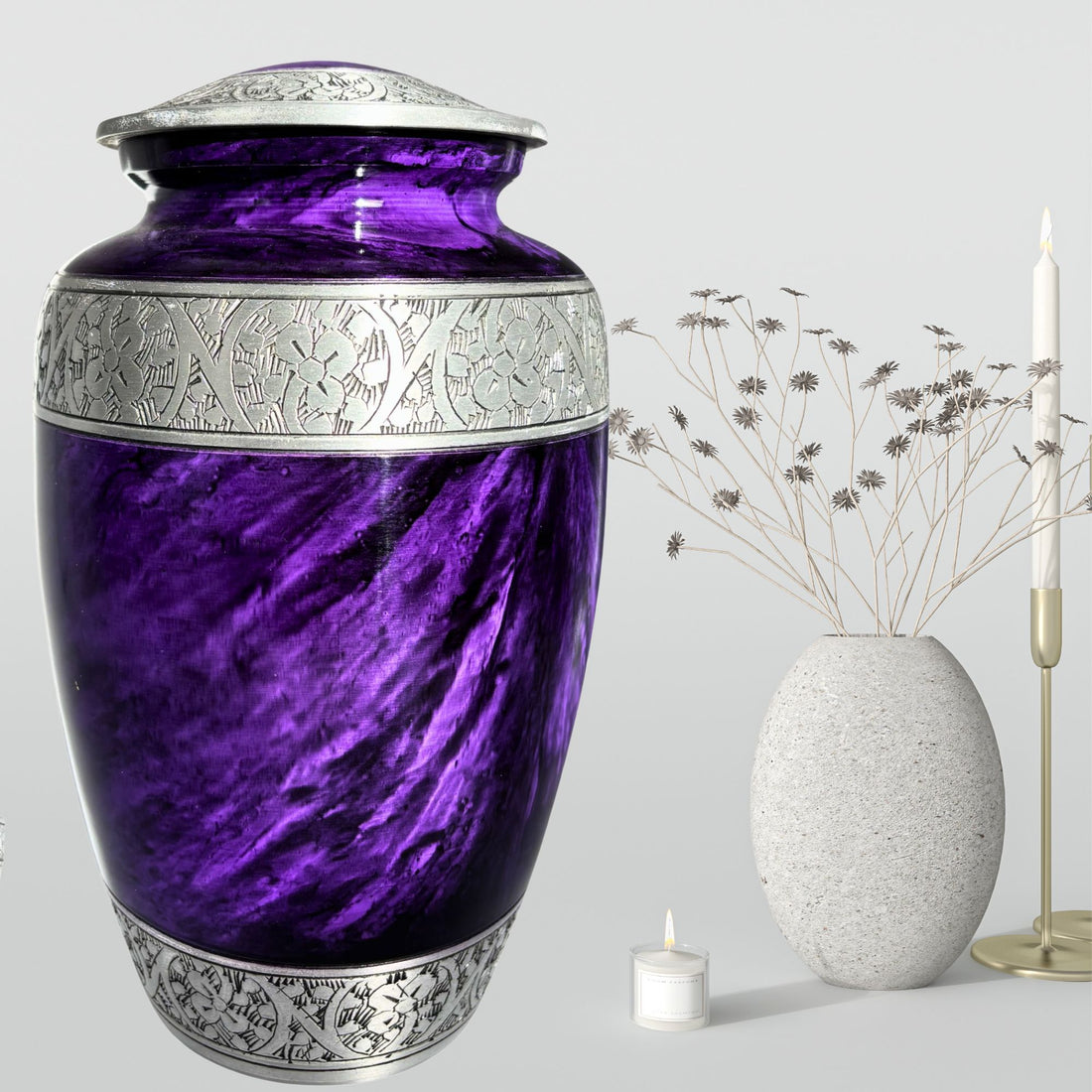 Purple urn with silver decorative elements on a white background