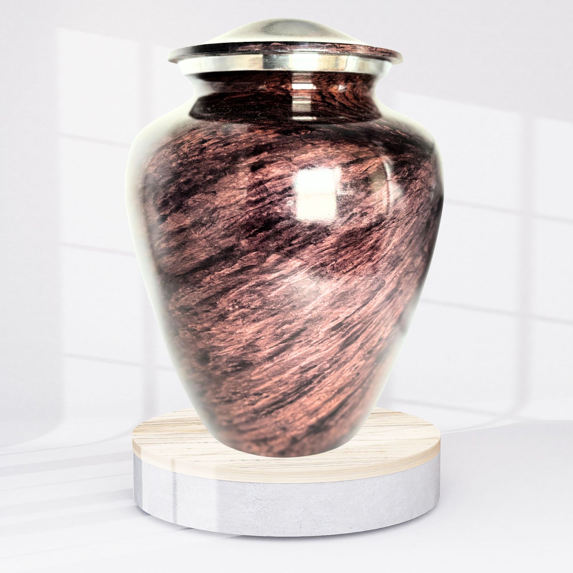 Copper urn with a silver lid on a white background