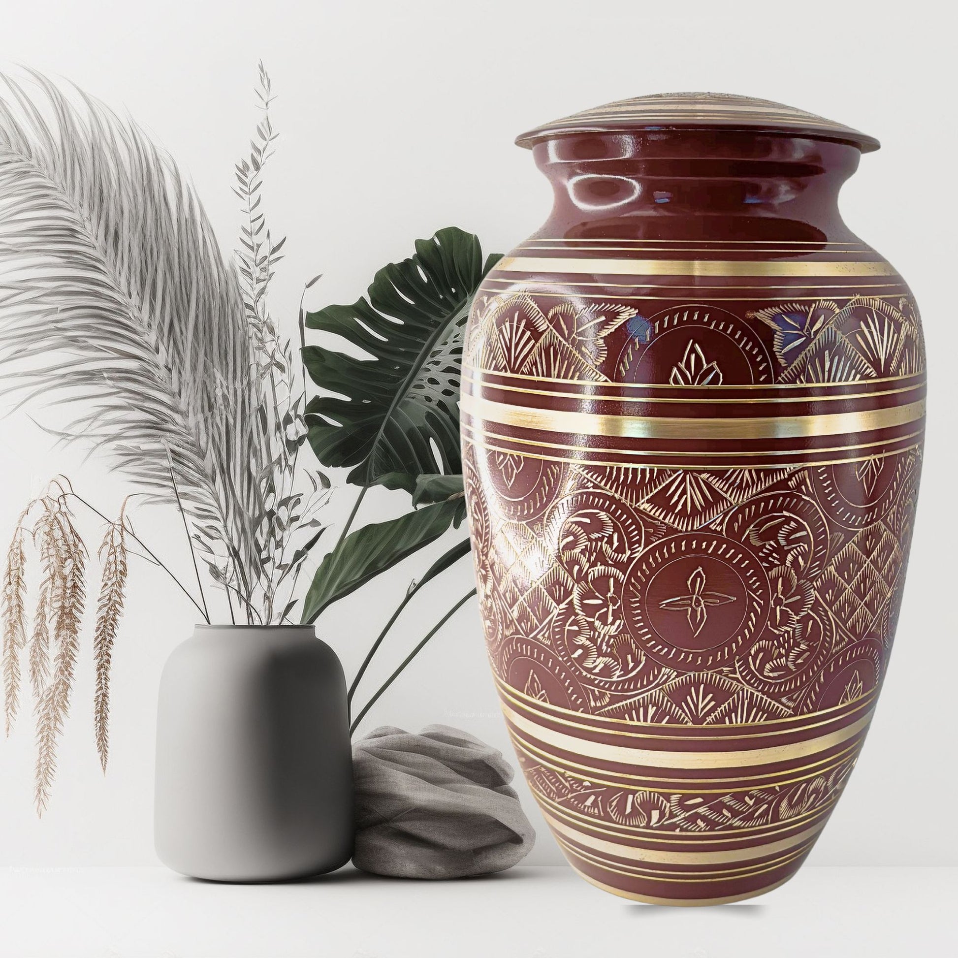 Decorative urn with intricate patterns on a white background