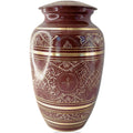 Decorative urn with intricate patterns on a white background