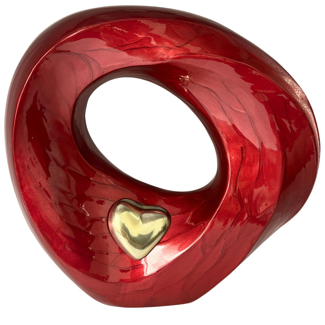 Red decorative Urn with a gold heart on a white background