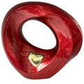 Red decorative Urn with a gold heart on a white background