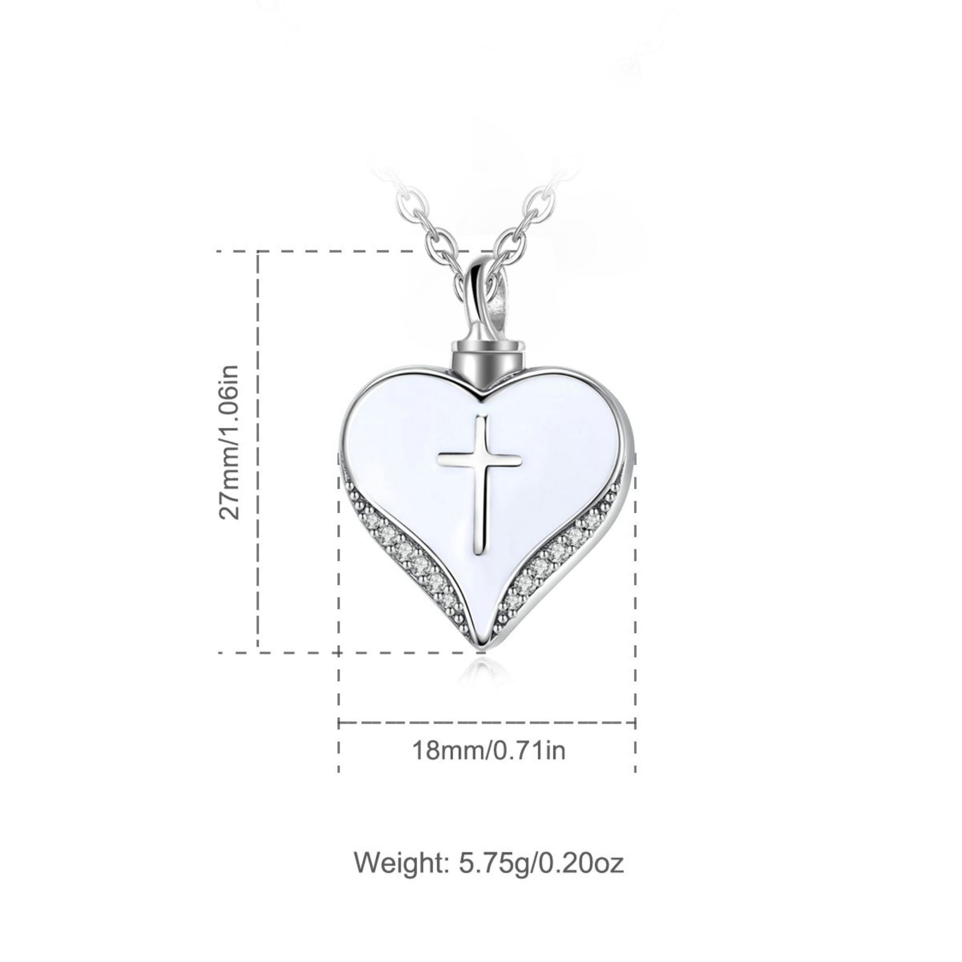 Heart-shaped pendant with cross design and measurements on a white background