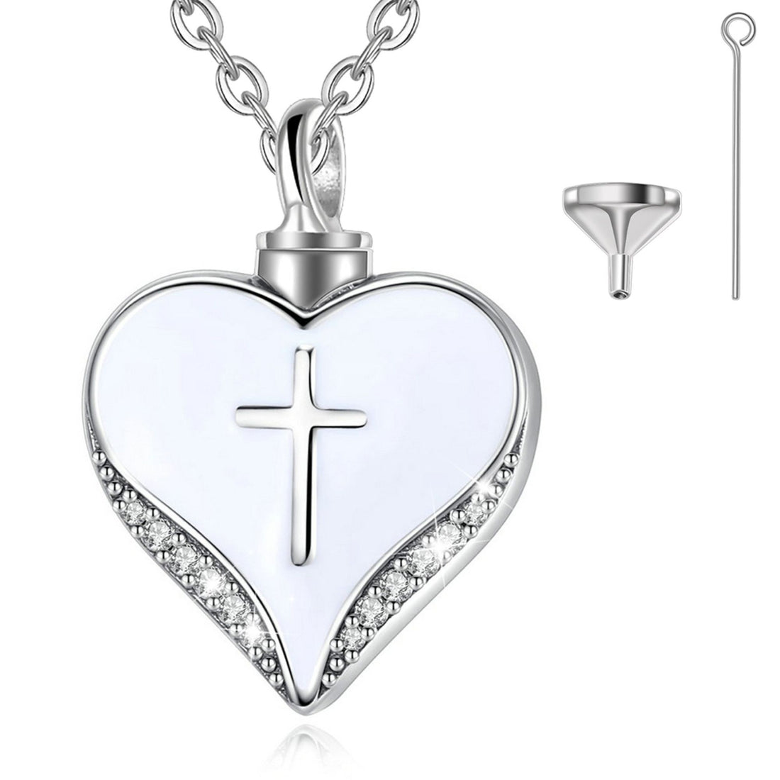 Heart-shaped pendant with cross design on a white background