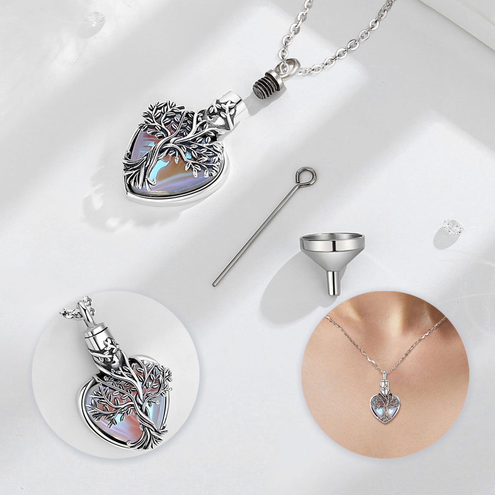 Silver tree of life pendant with a chain on a white background