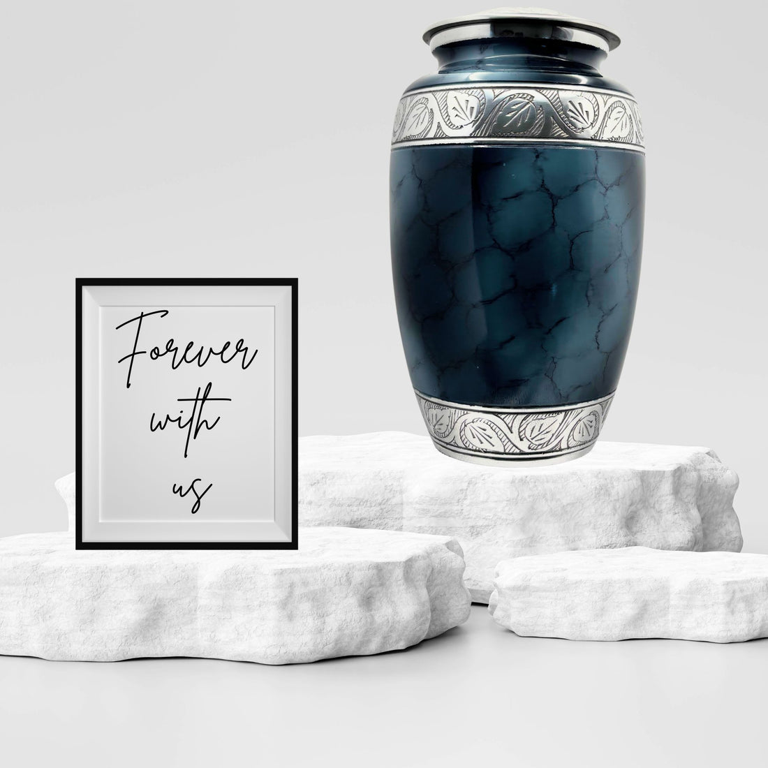 Blue marble-patterned urn with silver decorative elements on a white background