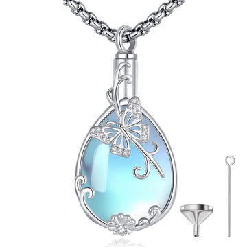 Teardrop-shaped pendant with butterfly design on a white background