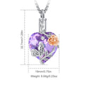 Heart-shaped pendant with purple crystal, rose, and butterfly design on a white background with measurements.