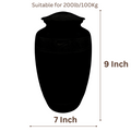 Black urn with dimensions labeled on a white background