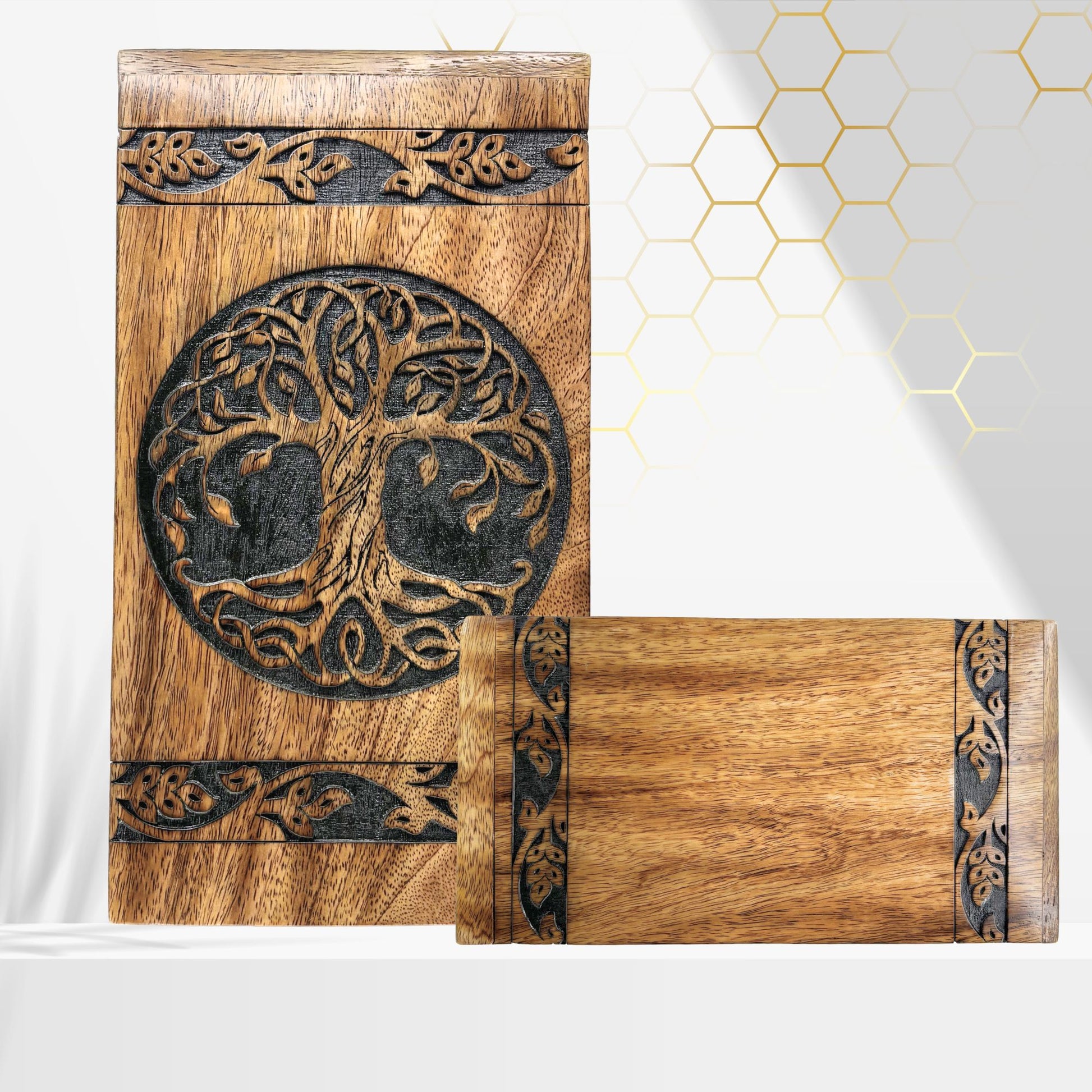 Wooden box with tree of life design on a white background