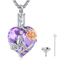 Heart-shaped purple pendant with rose and butterfly design on a white background