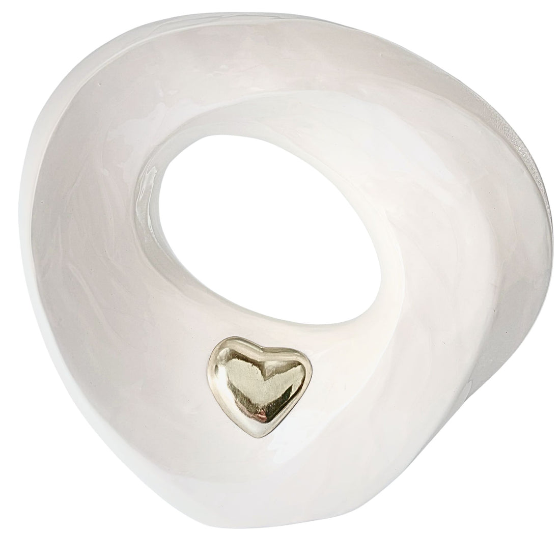 White ceramic ring Urn with a gold heart-shaped inset on a white background