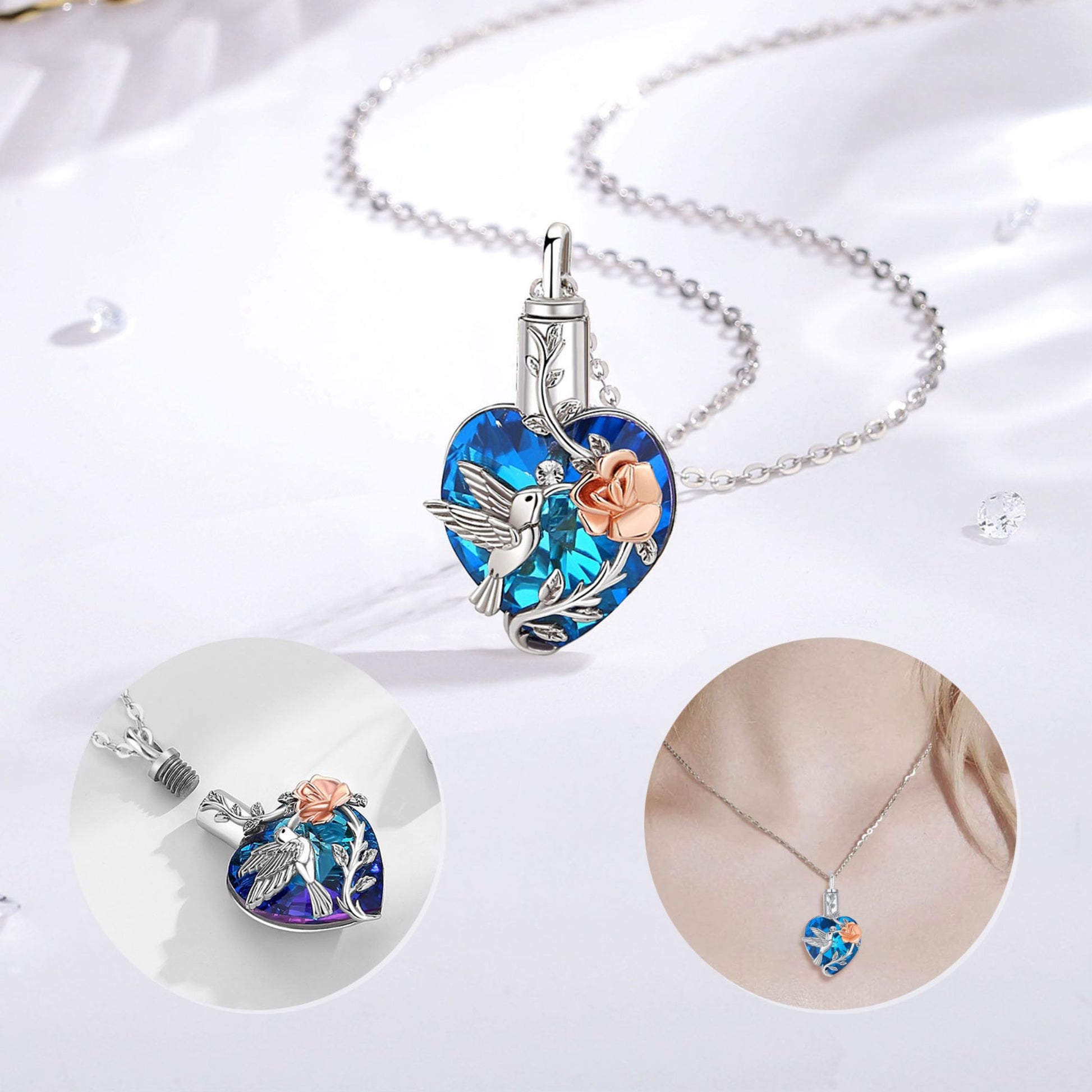 Heart-shaped pendant with blue gem and floral design on a white background
