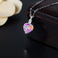 Necklace with a purple pendant featuring a dove and flower design on a dark background.