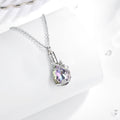 Silver necklace with a colorful teardrop pendant on a white background