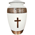 White urn with bronze cross and decorative band on a white background